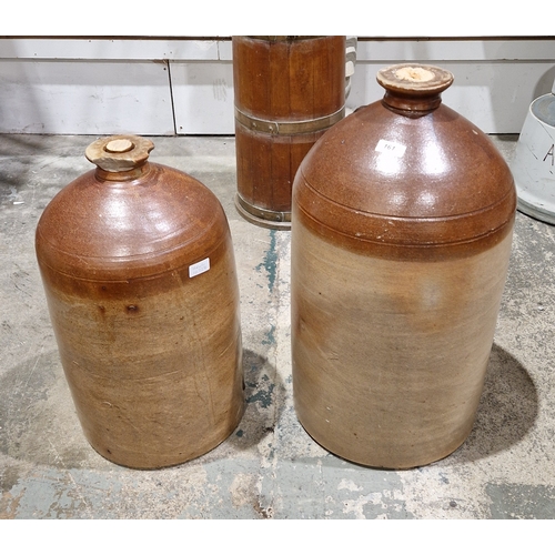 161 - Two large 19th century two-tone brown stoneware flagons, the rims with impressed marks for Baull & C... 