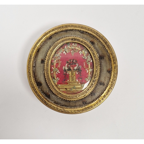 177 - Continental gilt-metal and tortoiseshell mounted circular snuff-box, late 18th/early 19th century, t... 