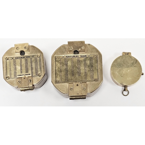 199A - Two replica Stanley of London brass compasses, largest 8cm wide and another gilt metal cased compass... 