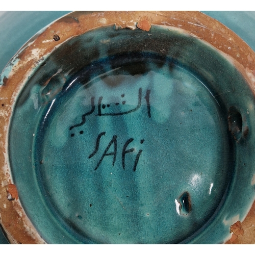 23 - Group of contemporary Moroccan pottery including a tagine dish and conical cover, a turquoise glazed... 