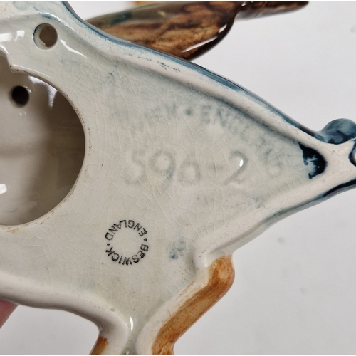 27 - Set of three Beswick pottery duck wall plaques in sizes, printed and impressed marks (damages and re... 