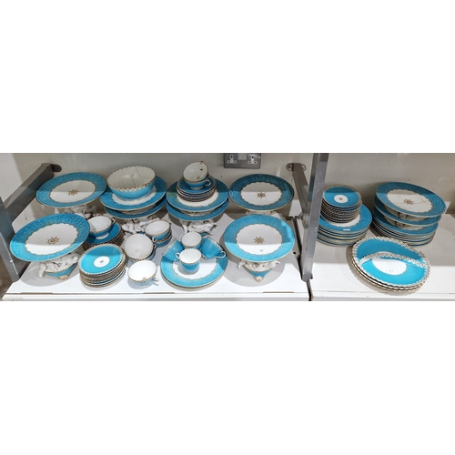 29 - English porcelain turquoise ground composite part tea and dessert service in the Minton style, impre... 