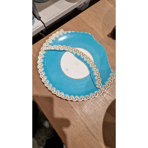 29 - English porcelain turquoise ground composite part tea and dessert service in the Minton style, impre... 