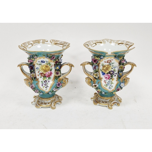 39 - Pair of Meissen baluster two-handled flower encrusted vases, late 19th century blue crossed swords m... 