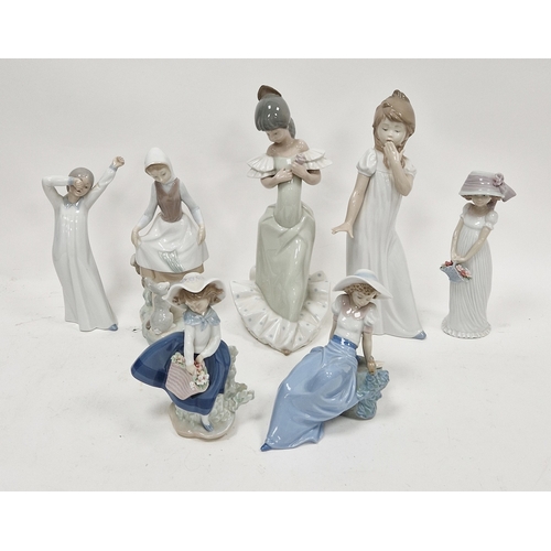9 - Collection of Lladro and Nao porcelain figures, printed blue and brown marks, various incised numera... 