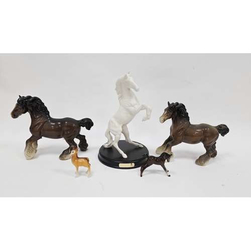 17 - Royal Doulton Spirit of the Wild white model of a rearing stallion, on circular wooden base, applied... 