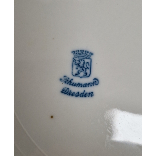 53 - Three 20th century Dresden pierced dessert plates, in sizes and a continental porcelain two-handled ... 