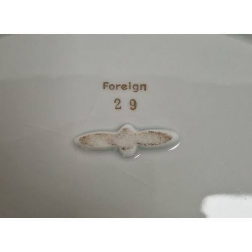 53 - Three 20th century Dresden pierced dessert plates, in sizes and a continental porcelain two-handled ... 