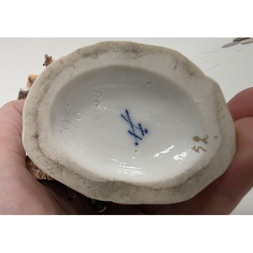 57 - Meissen porcelain figure group emblematic of winter, circa 1880, blue cross swords marks, pressnumer... 