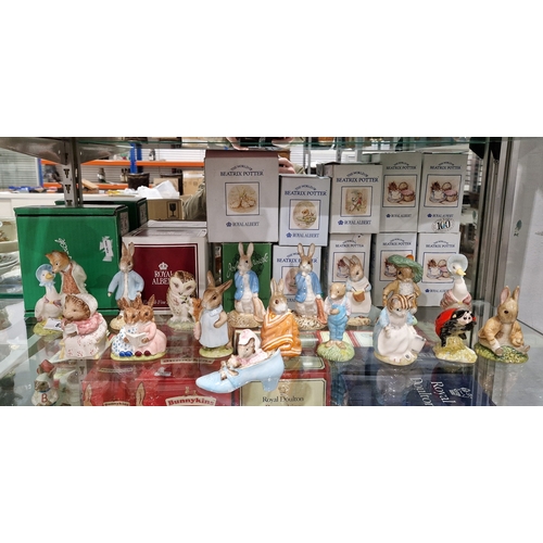 69 - Collection of Royal Albert and Beswick Beatrix Potter figures including the Old Woman Who Lives in a... 
