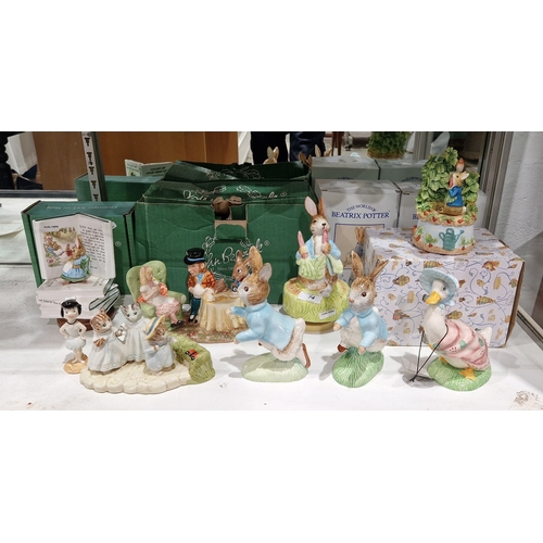74 - Collection of Beswick pottery Beatrix Potter figures including Peter Rabbit (2), Royal Doulton Jemim... 