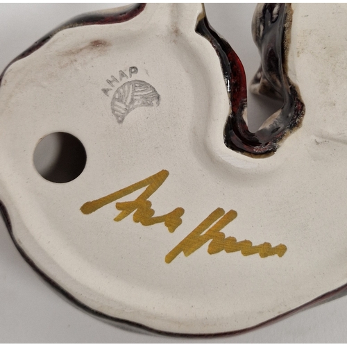 76 - Model of a Staffy dog by Anita Harris, 11cm high and a fox, recumbant, both signed in gilding, print... 