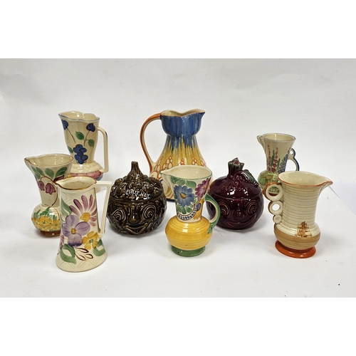 78 - Collection of Wade Heath and other Art Deco pottery jugs in sizes, various printed and impressed fac... 