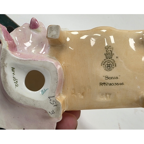 83 - Royal Doulton bone china figure of The Hinged Parasol, painted and printed green marks, HN1378, impr... 