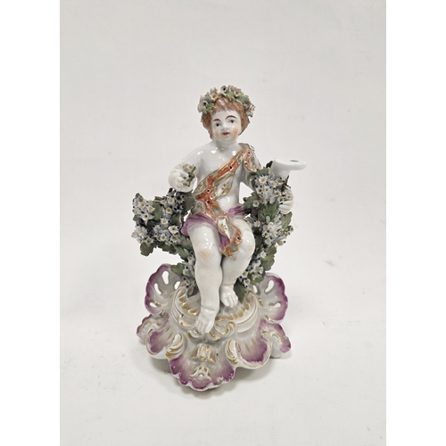 88 - Derby porcelain putto candlestick figure, circa 1775, with flowering bocage on pierced puce gilt roc... 