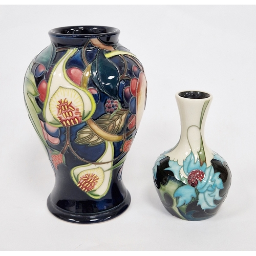 89 - Two Moorcroft vases comprising a Queens Choice pattern vase by Emma Bossons decorated with tubelined... 