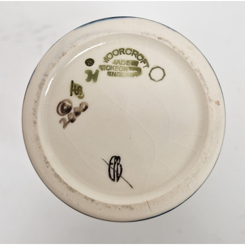 89 - Two Moorcroft vases comprising a Queens Choice pattern vase by Emma Bossons decorated with tubelined... 