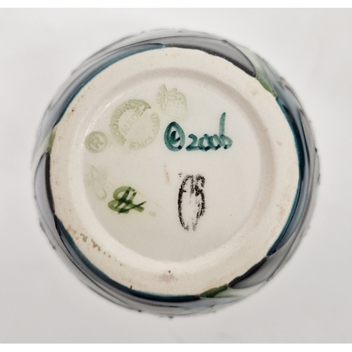 89 - Two Moorcroft vases comprising a Queens Choice pattern vase by Emma Bossons decorated with tubelined... 