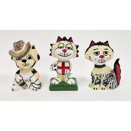 9 - Three Lorna Bailey models of cats, each signed in black enamel, comprising the England Footballer ca... 