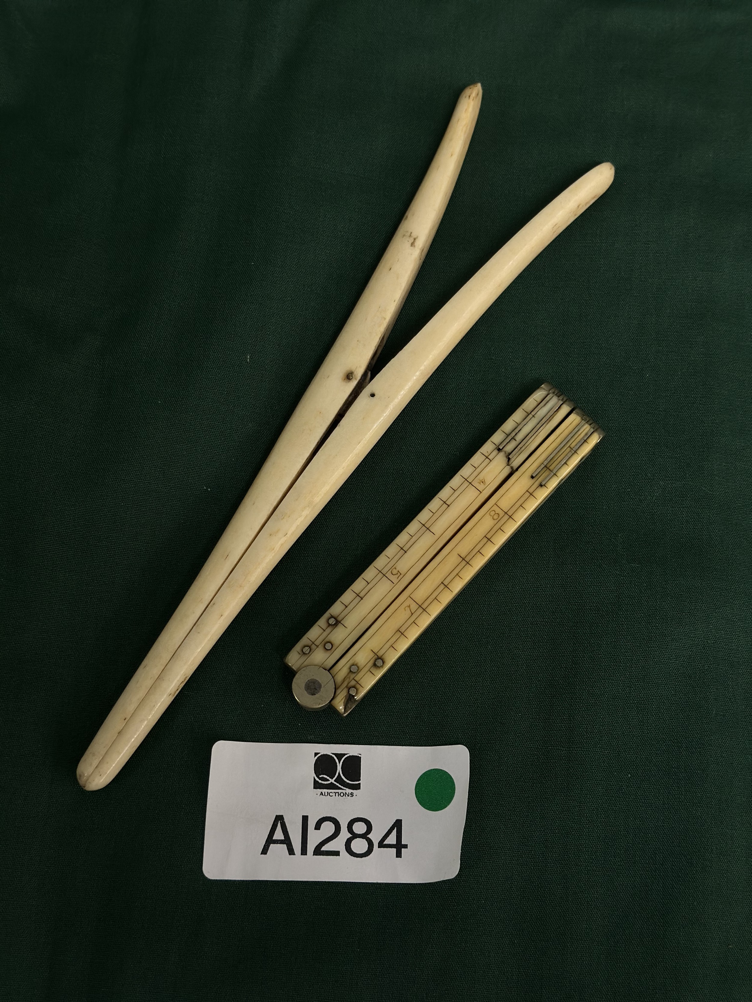 Pair of bone ladies glove stretchers & bone ruler