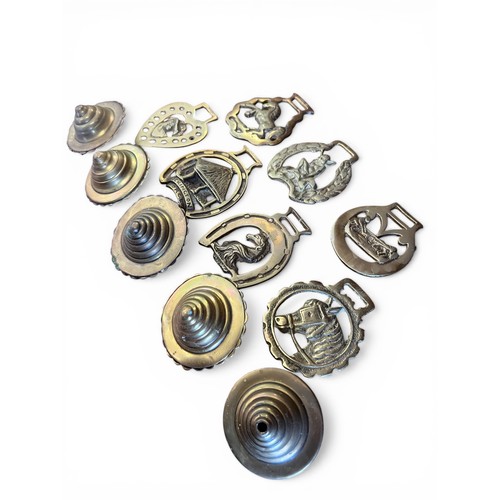 297 - Group of Twelve Horse Brass Pendants