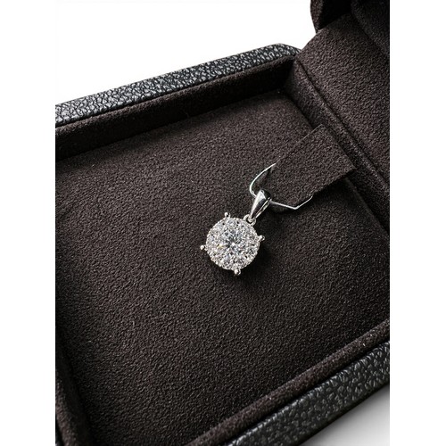 86 - 18ct White Gold Diamond Drop Pendant