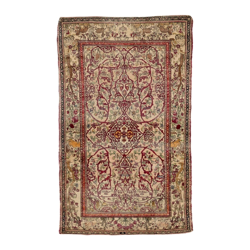 132 - An Isfahan silk rug, Central Persia, circa 1900 212cm x 130cm... 