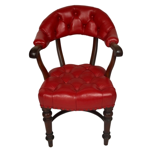 246 - A Victorian red leather upholstered desk chair, by B.Taylor, New Bond Street The buttoned half back ... 