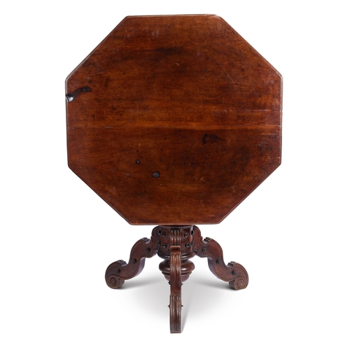 32 - A late 17th century Italian Tuscan walnut octagonal centre table The tilt top with moulded edge abov... 