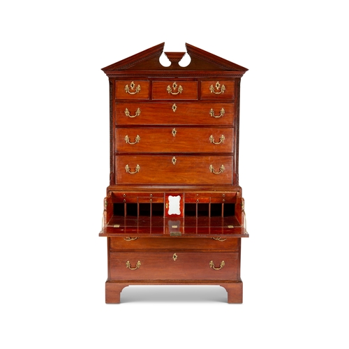 73 - A George III mahogany secretaire chest on chest  The broken arch Greek key moulded cornice abov... 