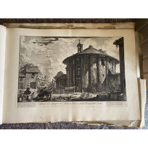 62 - A volume of etchings, the majority by Giovanni Battista Piranesi (1720-1778). Oblong 1o, 19th centur... 