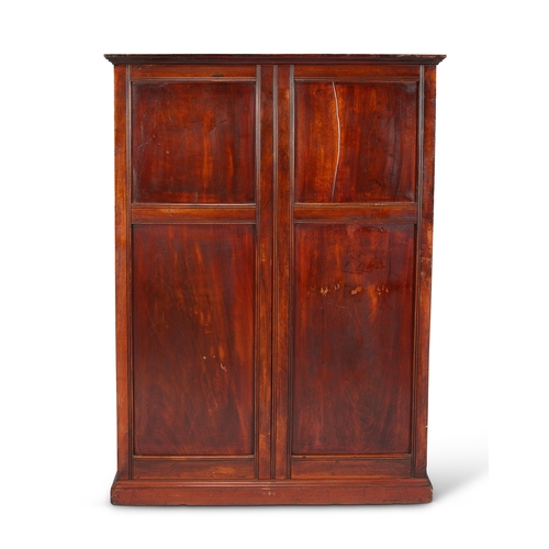 4 - A Victorian mahogany freestanding office or estate cupboard The rectangular cavetto moulded top abov... 