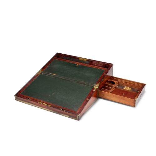 30 - A George IV mahogany and brass inlaid gentleman's lap desk The hinged lid enclosing a green leather ... 