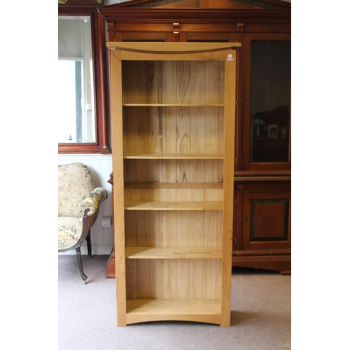 Contemporary oak narrow bookcase.