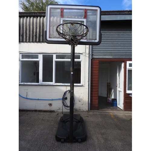 12 - Large Reebok adjustable basketball net