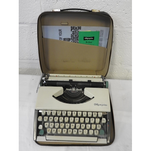 239 - Vintage cased Olympia typewriter