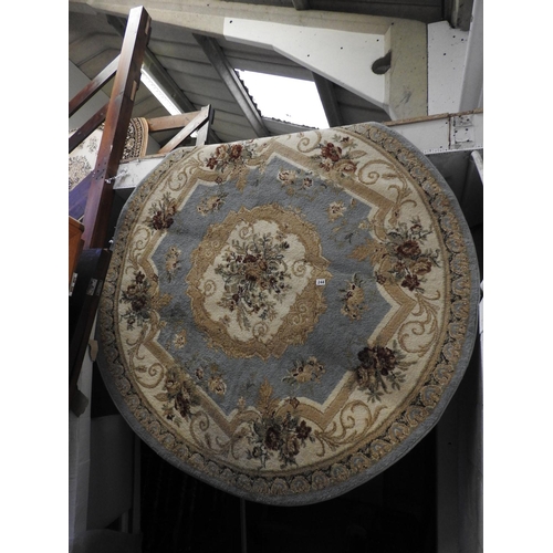 244 - Patterned circular rug - 70'' diameter