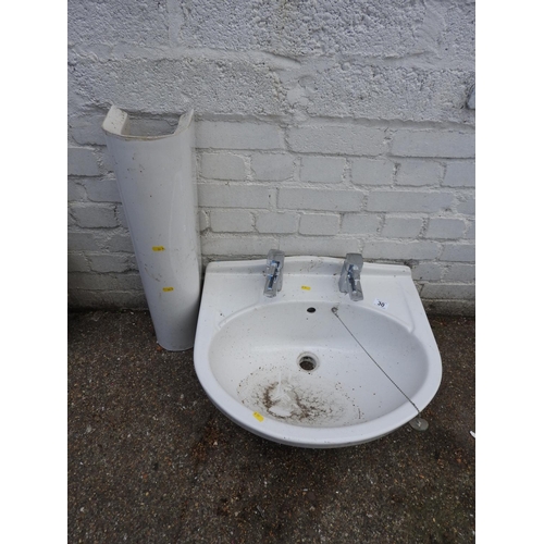 30 - Porcelain pedestal sink with taps