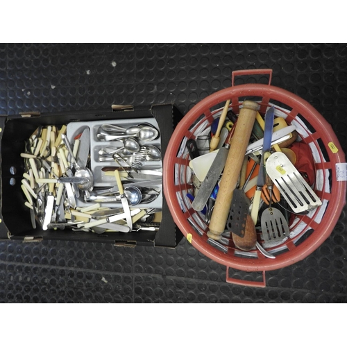 512 - Box of cutlery and a plastic basket of kitchenalia