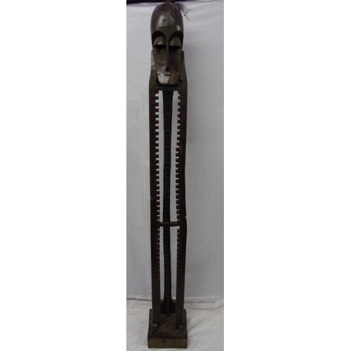 1183 - Carved treen African type CD/DVD rack