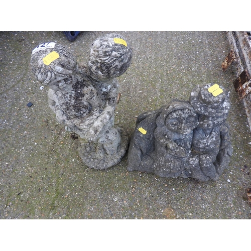 127 - 2x concrete garden ornaments - hedgehogs and cherubs