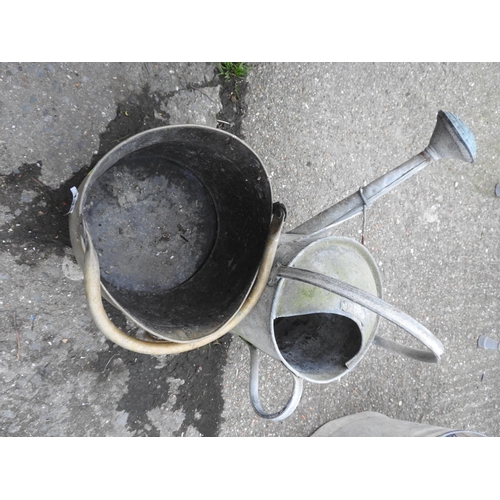 142 - Brass coal bucket and a galvanised watering can