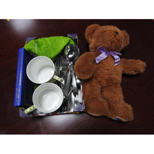 275 - Box of cutlery, mugs, heated teddy bear etc