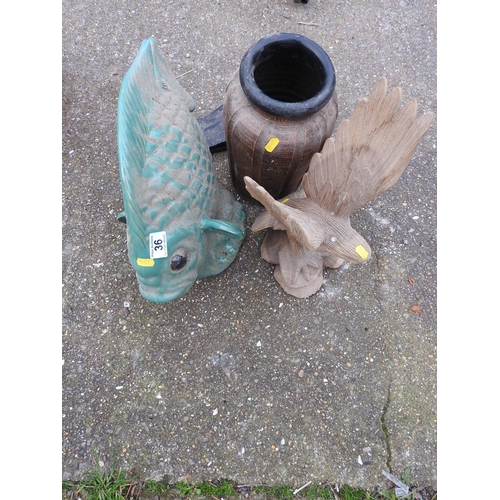 36 - Ceramic fish ornament, treen bird ornament, pot and an axe head