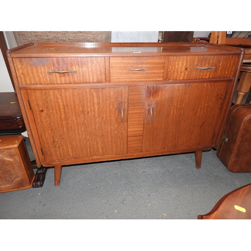 411 - Sideboard with three drawers over two cupboards