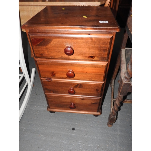 421 - Stained Pine five drawer bedside cabinet