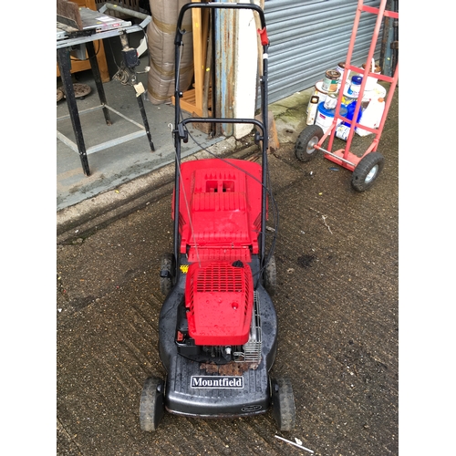 206A - Moutfield self propelled lawnmower seen working