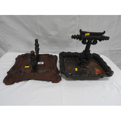 66 - 2x cast iron boot scrapes