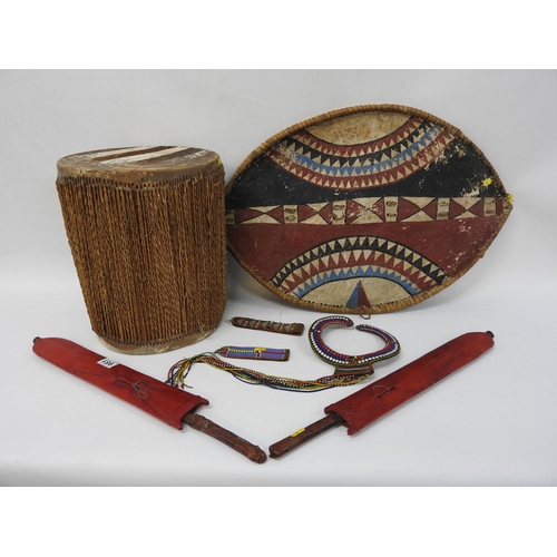 951 - Native African Maasai and tribal drum, daggers, shield costume etc