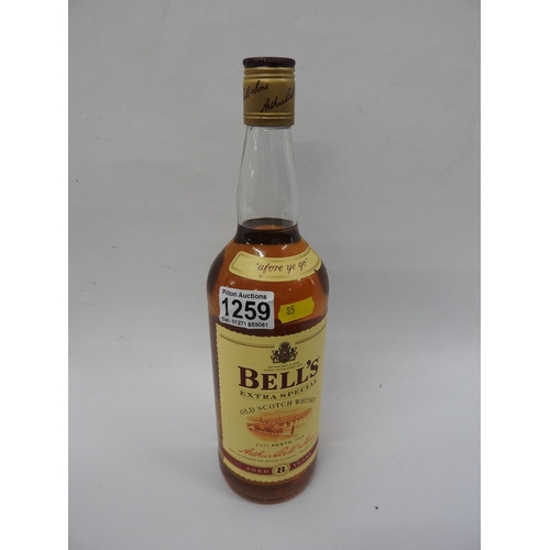 1259 - Litre bottle of Bells Whisky